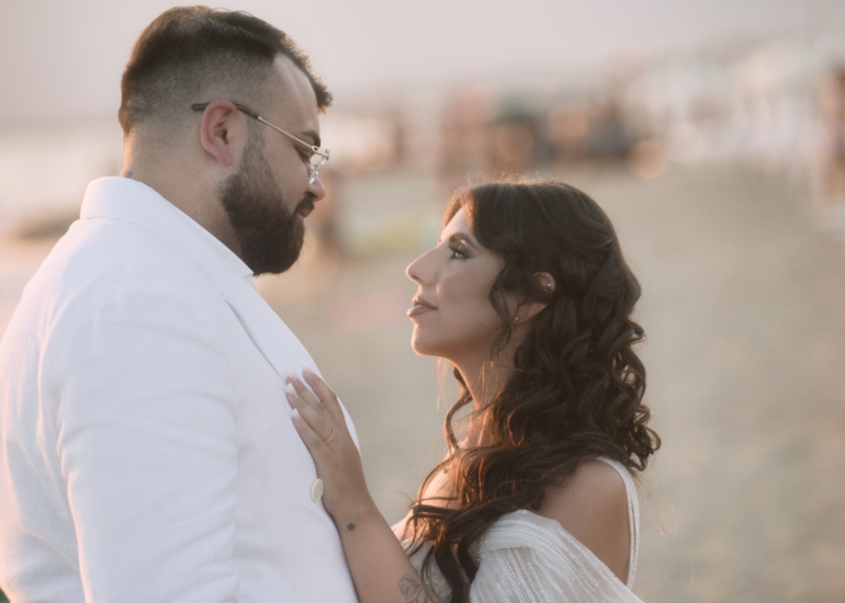 Bride and groom photographed in soft evening light rather than midday sun