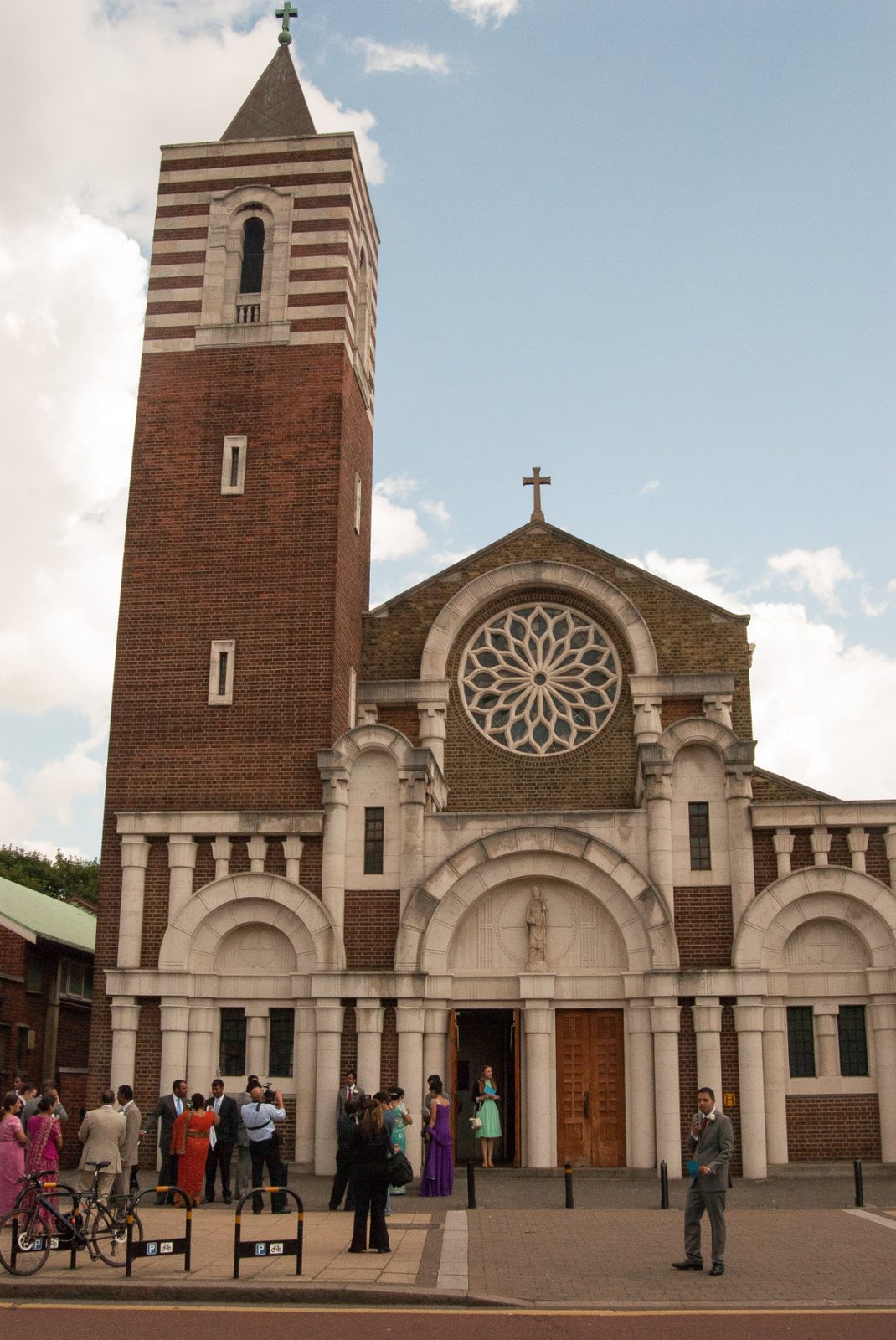 The Catholic church in London where an Indian Christian couple married, guests in saris gathering outside